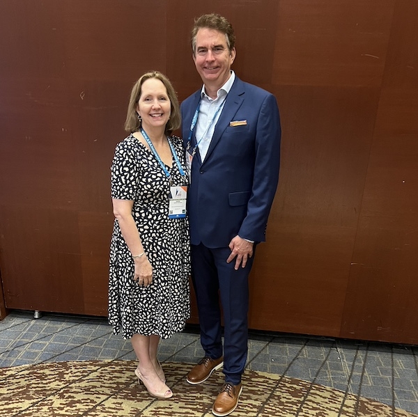 Former TBA President Sherie Edwards and current TBA President Ed Lanquist pose at the ABA Annual Meeting in Chicago August 2024