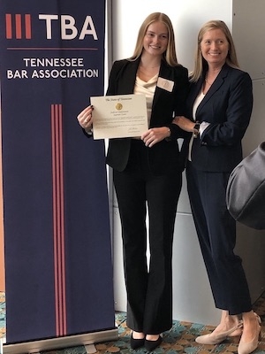 New lawyer Elizabeth Tirrill celebrates after taking the oath