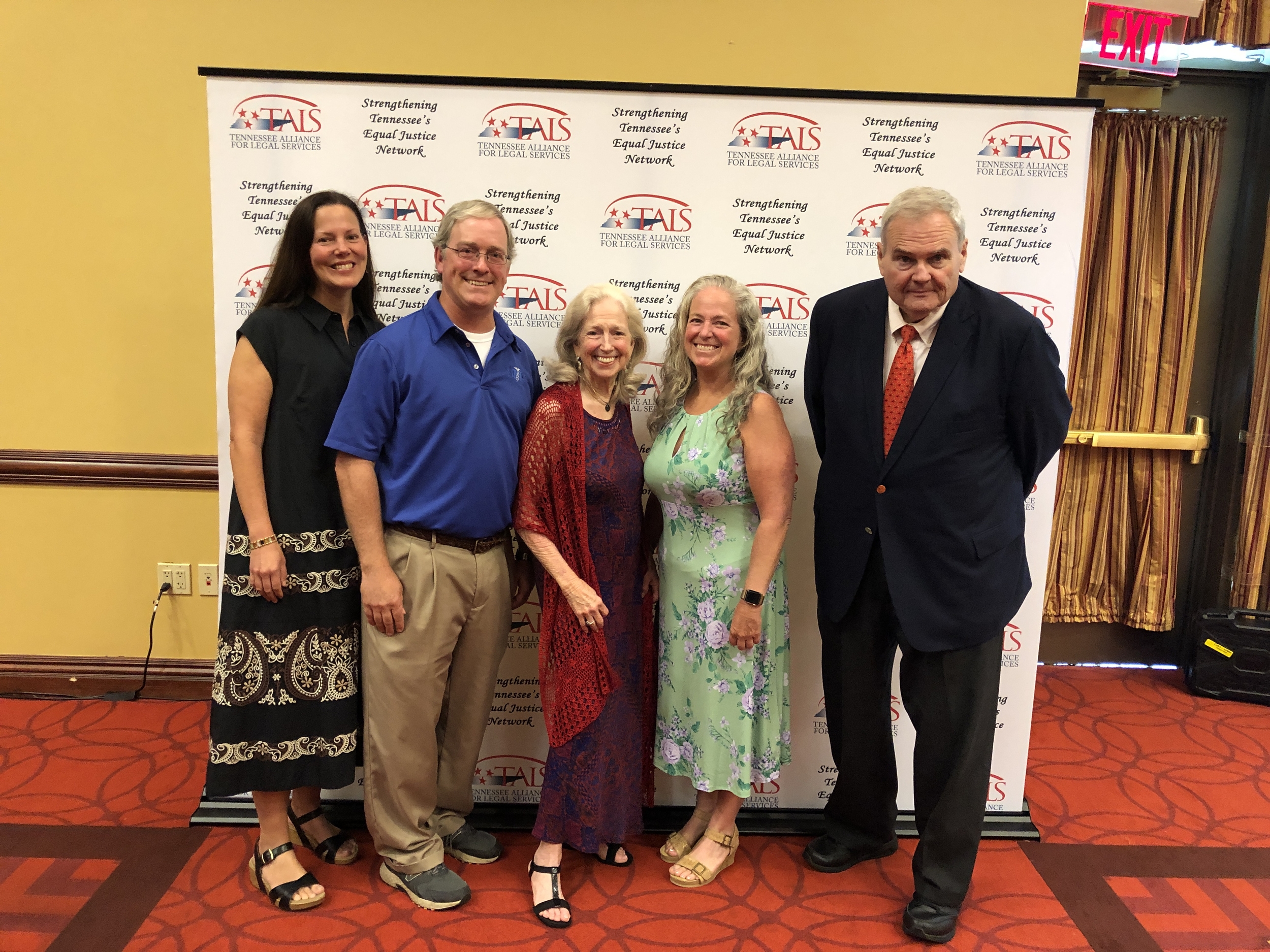 Members of Justice Frank Drowota’s family and Buck Lewis