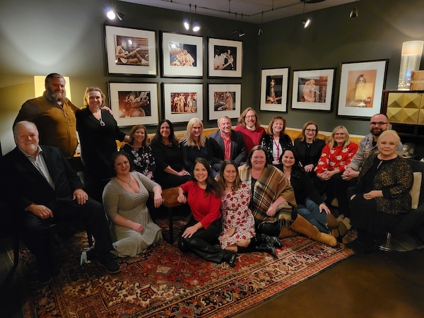 TBA staff gather for a holiday dinner in December 2023