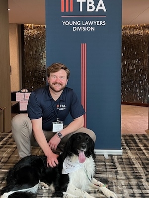 TBA YLD President-elect Judge Alex McVeagh with his dog