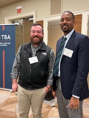 Nashville lawyer Darius Walker receives the TBA YLD Star of the Quarter Award from President Sean Aiello